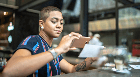 Woman taking a check picture