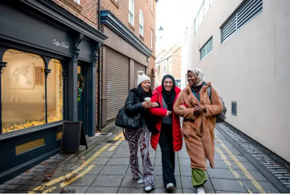 Women walking down a street