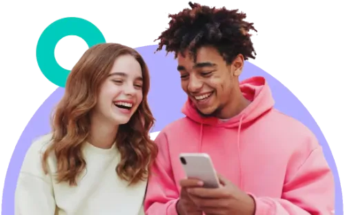 girl and boy smiling looking at a phone