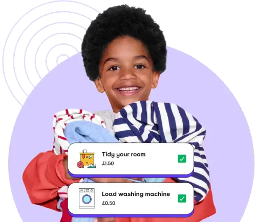 boy holding laundry