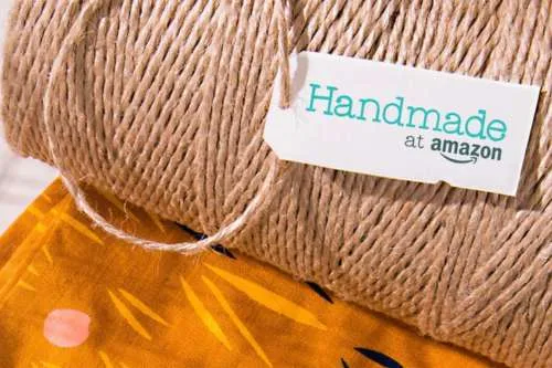 Close-up of natural jute twine rolled into a spool, featuring a 'Handmade at Amazon' tag