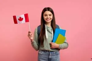 A smiling young student with a backpack holding textbooks and a small Canadian flag against a pink background, representing international or domestic study in Canada.